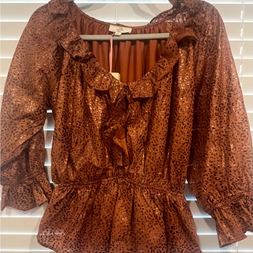 Beautiful brown and orange peplum blouse with subtle accents of gold